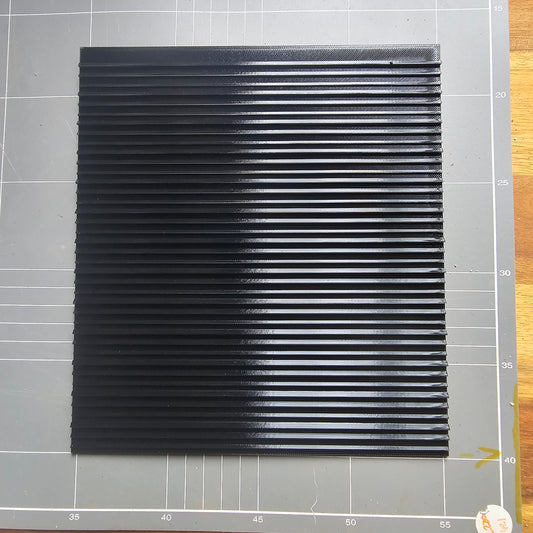 Low Profile Clean-Up Tile
