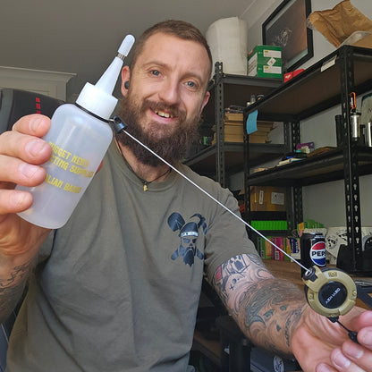 Snuffer Bottle with Retractable Lanyard